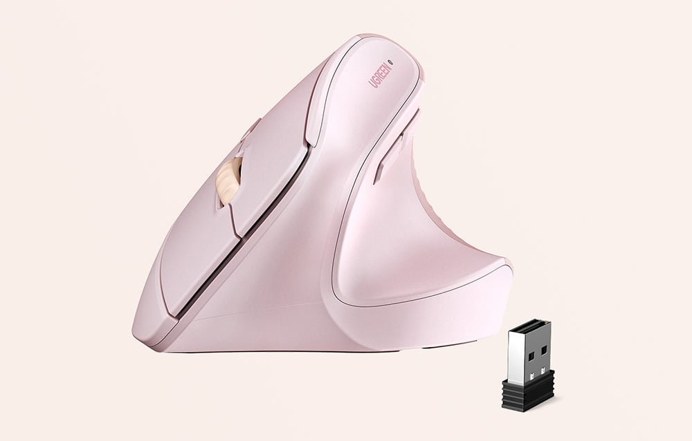Profile of the pink ergonomic UGREEN mouse with a visible USB receiver
