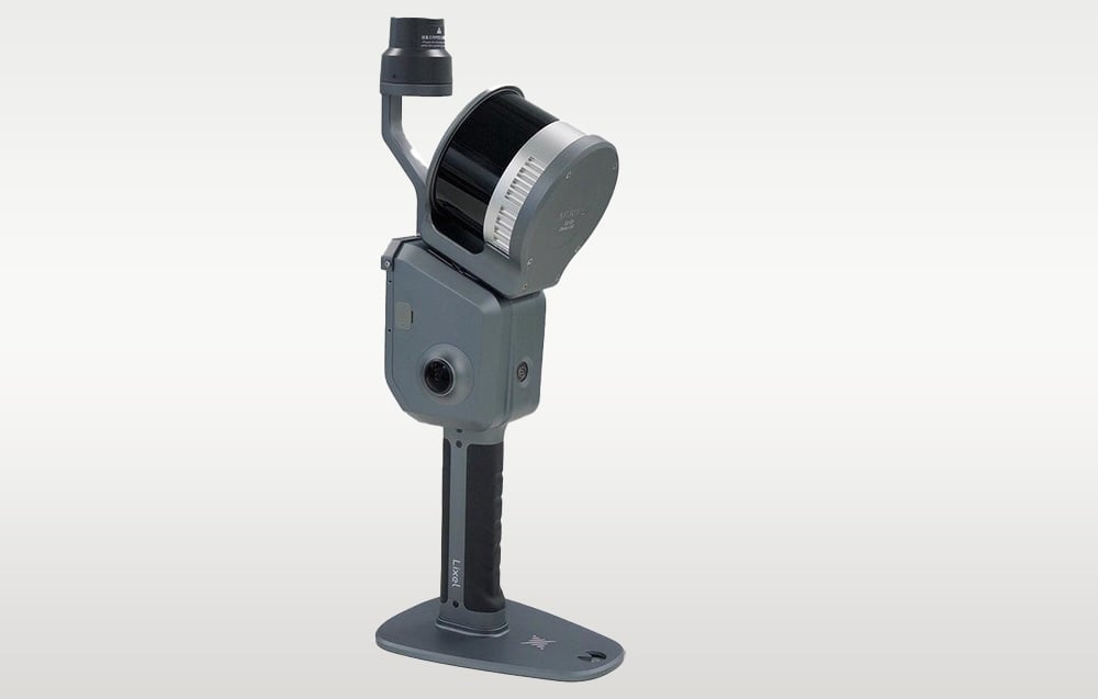 Gray 3D mobile scanner on light gray background.