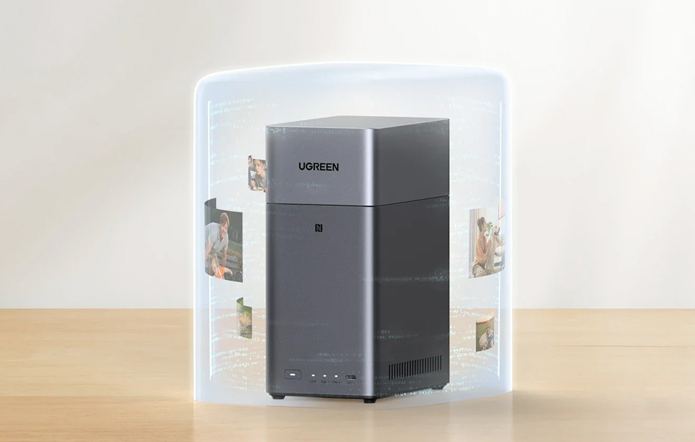 UGREEN NAS server in a transparent box with family photos, standing on a wooden counter