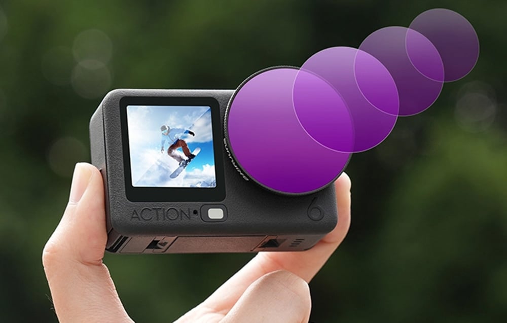 A person holds a sports camera with an applied purple filter in several variations of intensity