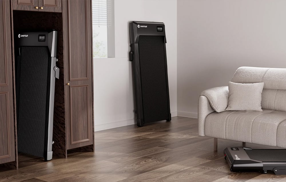 DeerRun treadmills folded and stored vertically against the wall and in a closet in the living room