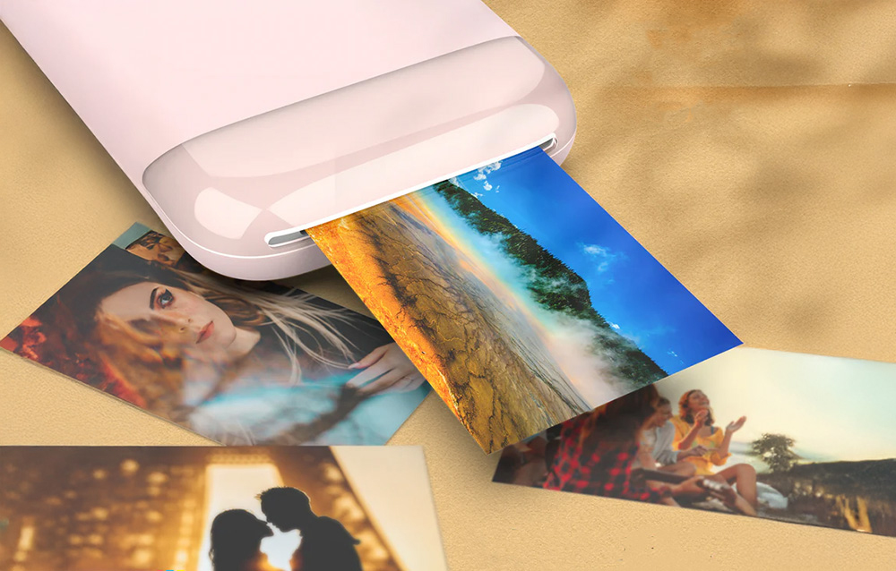 Portable photo printer that prints color photos