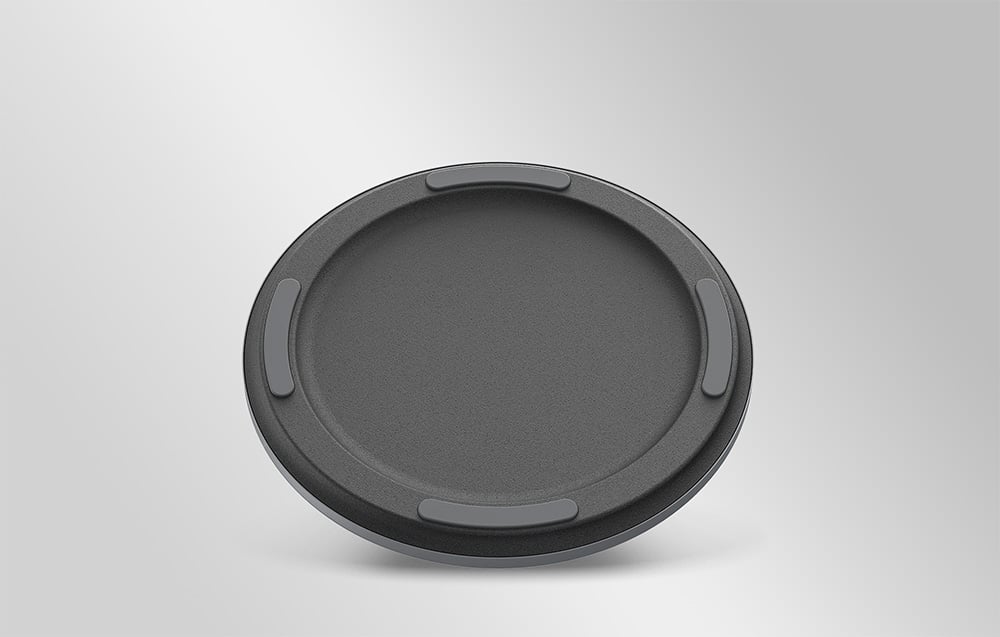 The underside of the round stand base with visible rubber anti-slip elements around the perimeter.