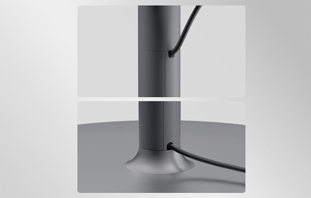Close-up of the stand’s rod with aesthetic openings to hide the power cable inside the structure.