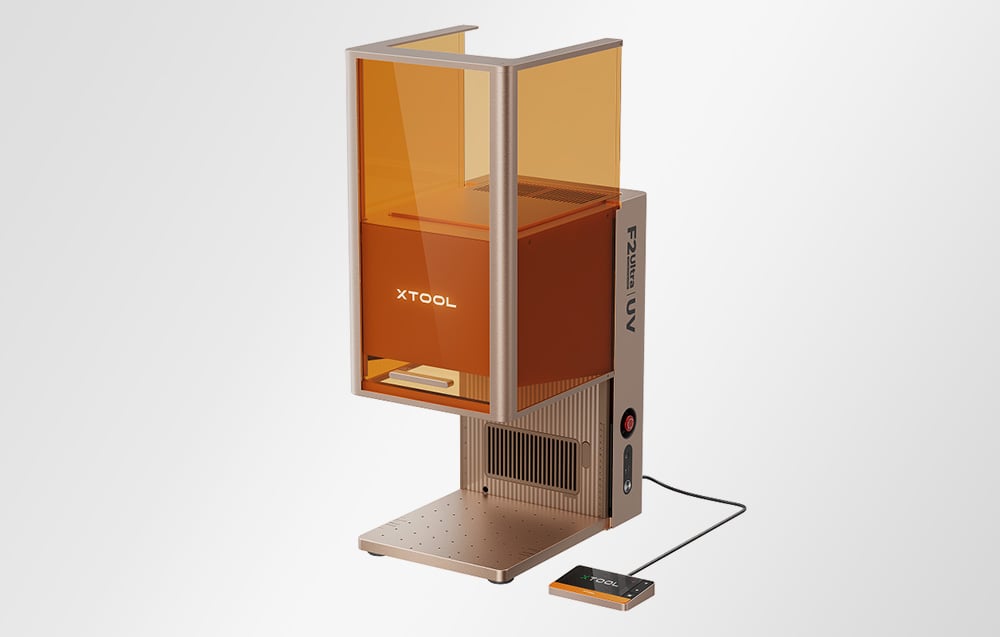 xTool F2 Ultra UV laser engraver with top cover open, showing the interior of the device