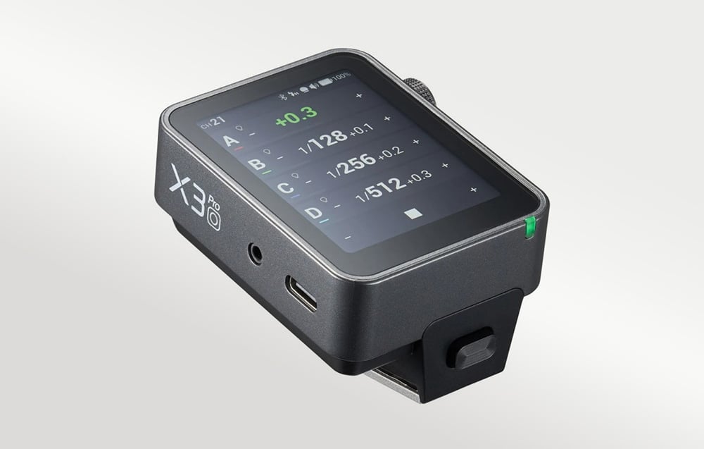 Godox X3 Pro flash trigger with visible USB-C port and mini-jack sync socket